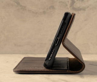 Demonstrating the built-in stand function of the Dark Brown Leather Stand Case for iPhone XR