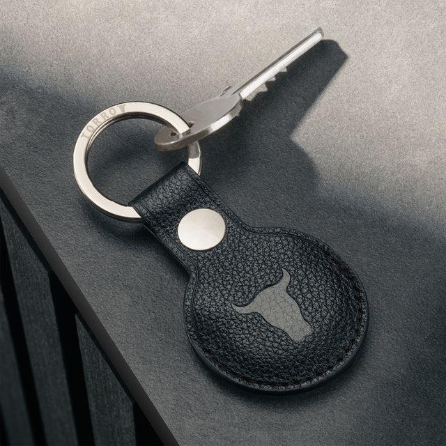 Black Leather Apple AirTag Holder Keyring attached to key