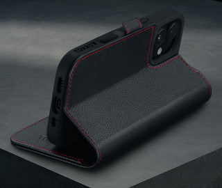 Stand function of the Black with Red Detail Leather Case for iPhone 16