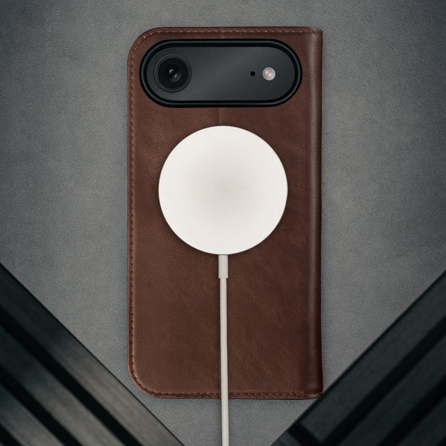 MagSafe charger attached to the Dark Brown Leather Case for iPhone 17 Air