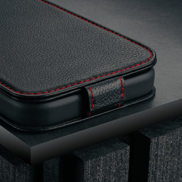 Magnetic closure clasp on the Black with Red Stitching Leather Flip Case for iPhone 17 Pro