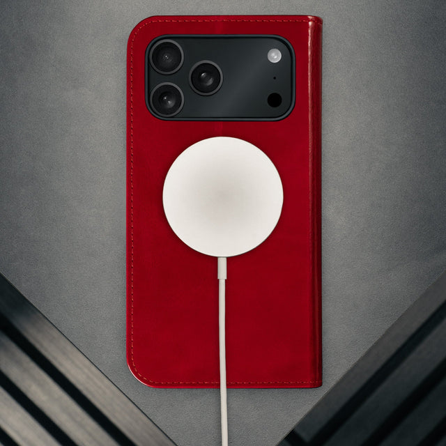 MagSafe charger attached to the Red Leather Case for iPhone 17 Pro Max